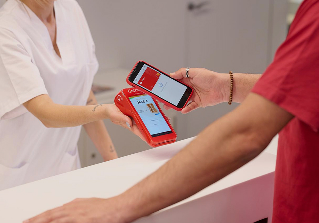 Client paying. Health & Beauty